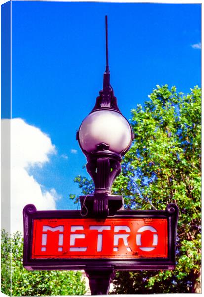Iconic Metro sign in Paris Canvas Print by Gerry Walden LRPS
