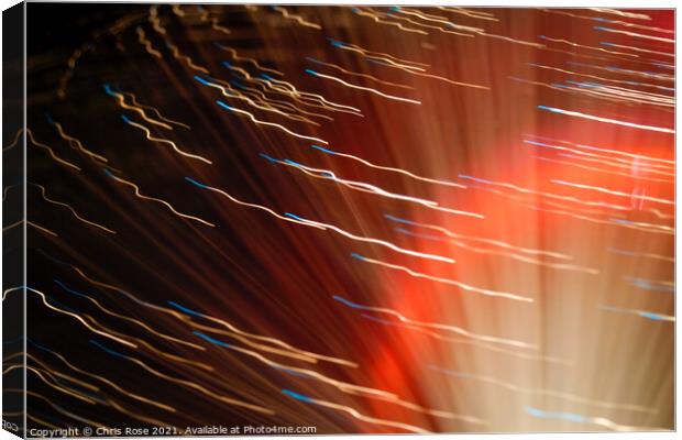 Coloured lights and motion blur abstract Canvas Print by Chris Rose
