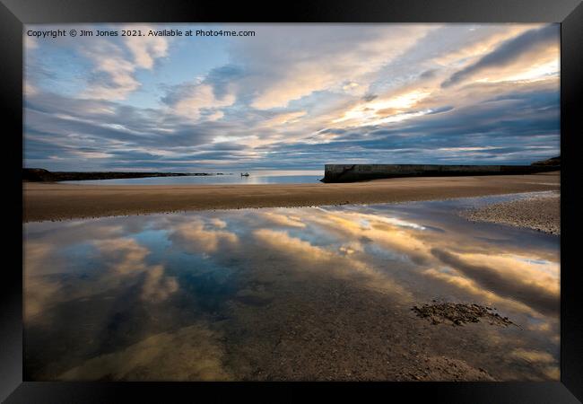 Reflections in the wet sand Framed Print by Jim Jones