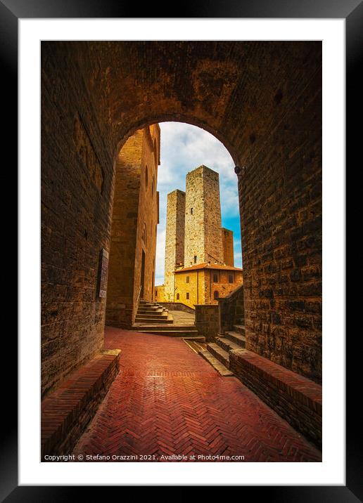 San Gimignano towers from a tunnel, Tuscany Framed Mounted Print by Stefano Orazzini