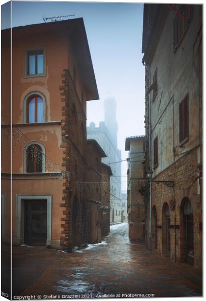 Volterra old town during a snowfall in winter. Tuscany, Italy Canvas Print by Stefano Orazzini