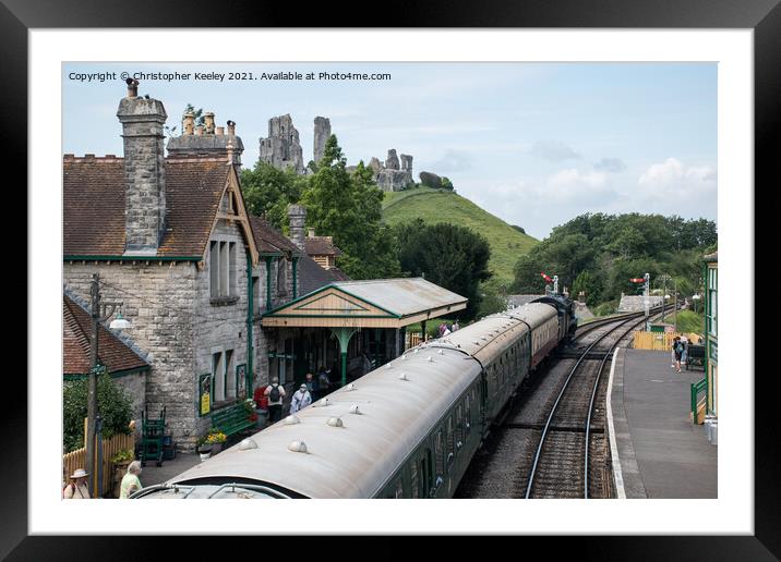 A steam train at Corfe Castle Framed Mounted Print by Christopher Keeley