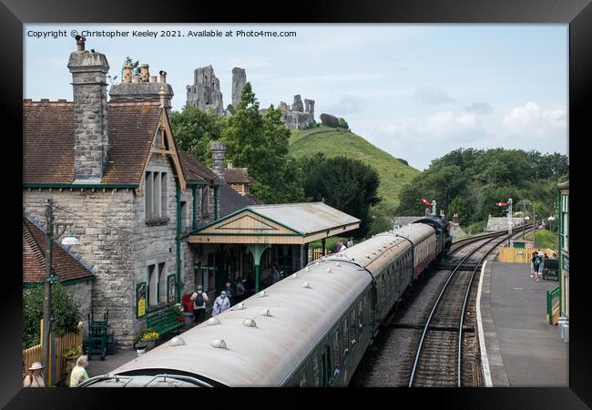 A steam train at Corfe Castle Framed Print by Christopher Keeley