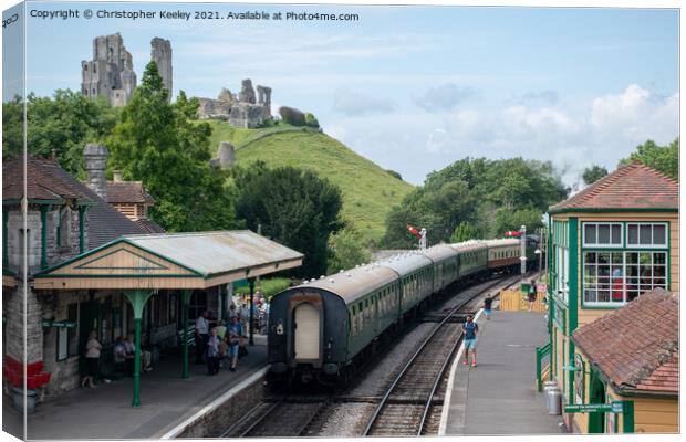 Steam train at Corfe Castle Canvas Print by Christopher Keeley