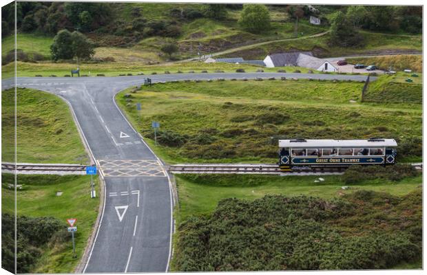Tram on the Great Orme crossing the road Canvas Print by Jason Wells