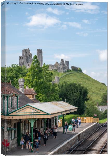 Corfe Castle and railway station Canvas Print by Christopher Keeley