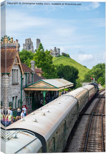 Steam train at Corfe Castle Canvas Print by Christopher Keeley