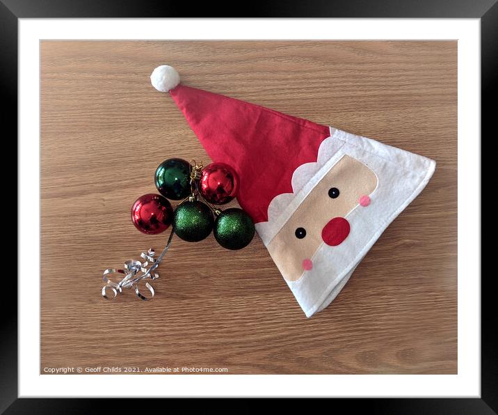  Christmas decorations Santa Hat - theme image. Framed Mounted Print by Geoff Childs