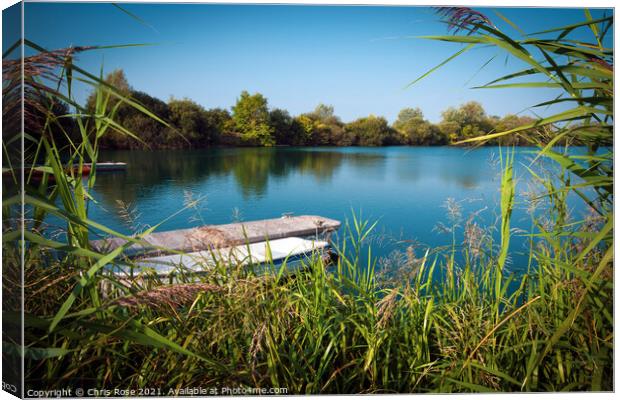 Tranquil lake Canvas Print by Chris Rose