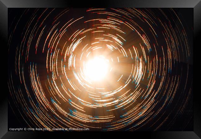 Fibre optic lamps, multi-coloured abstract on black background Framed Print by Chris Rose