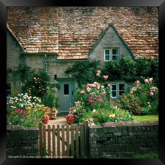 Bibury, Cotswold cottages Framed Print by Chris Rose