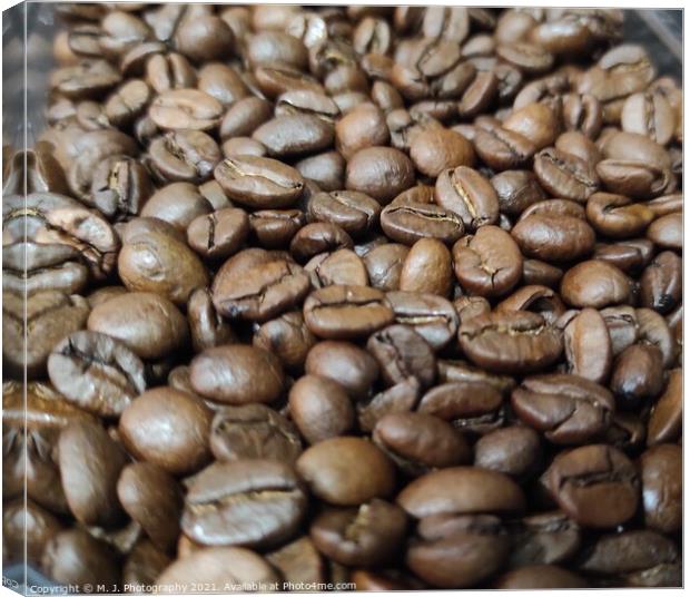 A close up look on fresh coffee beans Canvas Print by M. J. Photography