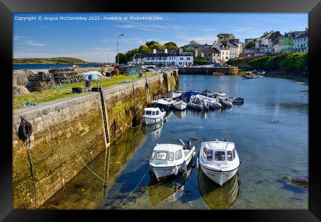 Boats tied up in Roundstone harbour, County Galway Framed Print by Angus McComiskey