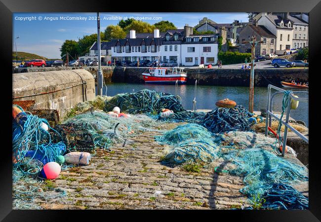Fishing nets on Roundstone quayside, County Galway Framed Print by Angus McComiskey