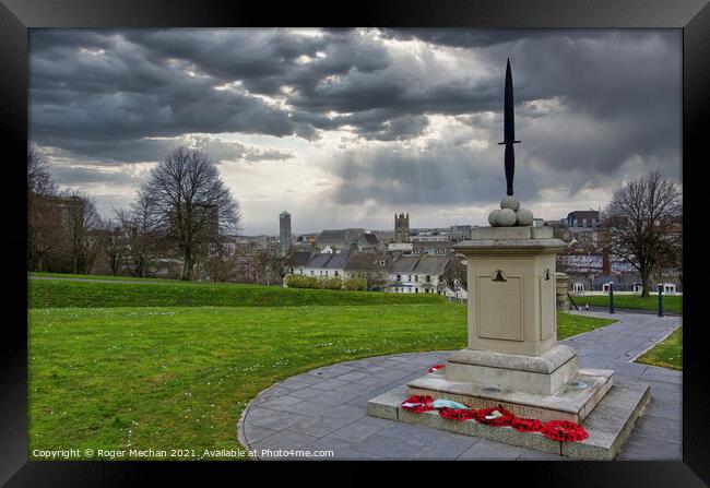 Royal Marines commando memorial  Framed Print by Roger Mechan