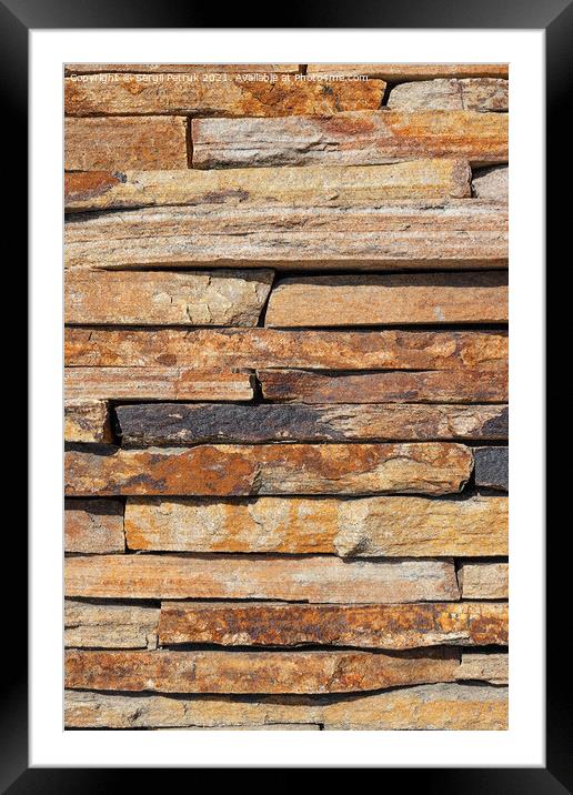 Brown slabs of old sandstone are lined with a wall. Framed Mounted Print by Sergii Petruk