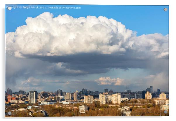 A large white-gray cloud hung over the city and was illuminated by the spring sunbeams. Acrylic by Sergii Petruk