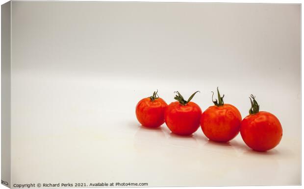 Vibrant Vine Tomatoes Canvas Print by Richard Perks