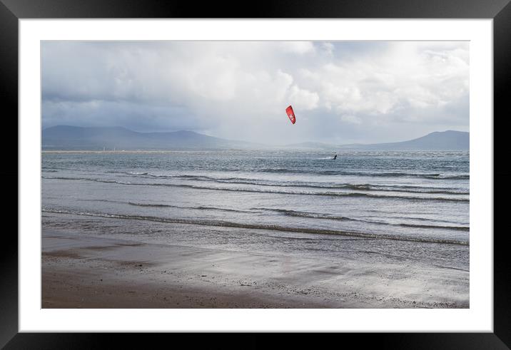 Kite surfer on the Anglesey coast Framed Mounted Print by Jason Wells