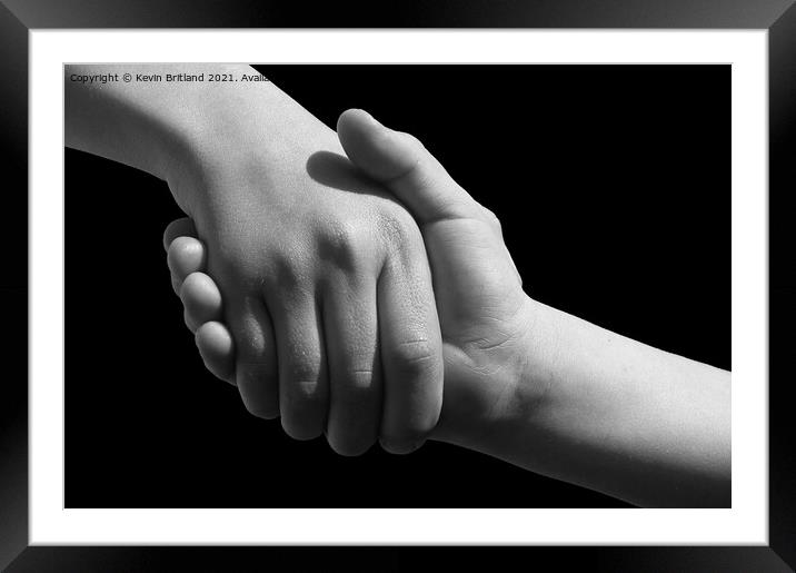 Handshake Framed Mounted Print by Kevin Britland