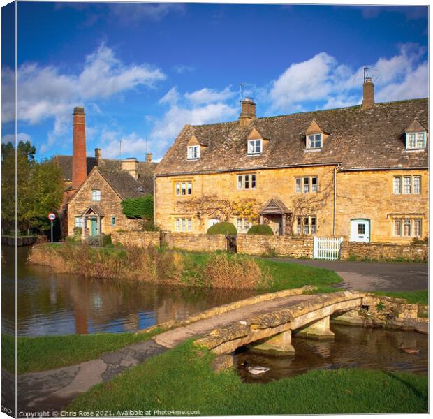 Lower Slaughter. Idyllic cotswold stone cottages Canvas Print by Chris Rose