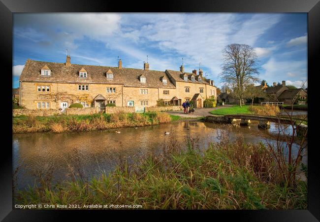 Lower Slaughter, idyllic riverside cottages Framed Print by Chris Rose