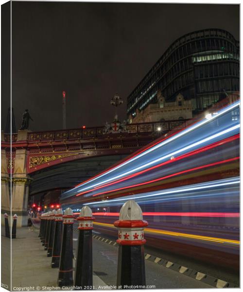 Bus light trail at Holborn Viaduct Canvas Print by Stephen Coughlan