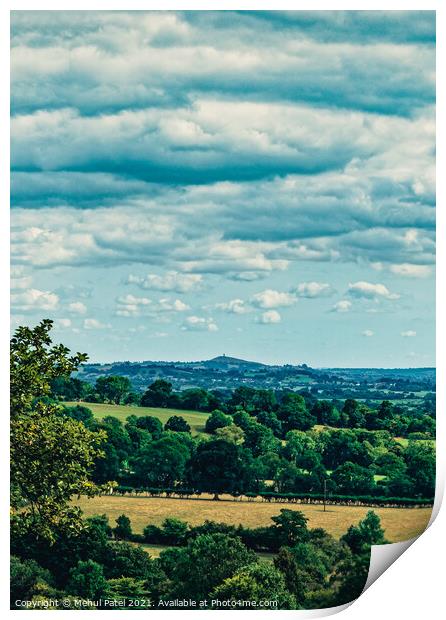 View of Glastonbury Tor in the distance and its surrounding countryside from summit of Cheddar Gorge Print by Mehul Patel