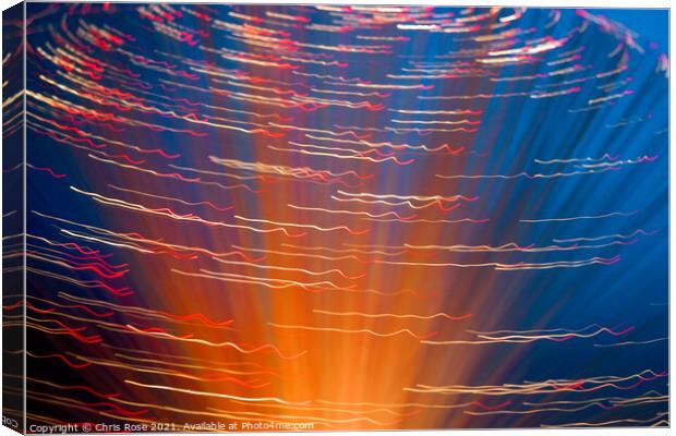 Coloured lights and motion blur abstract Canvas Print by Chris Rose