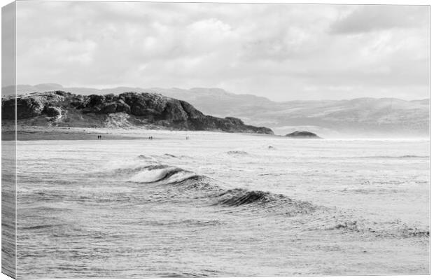Waves crash onto Criccieth beach Canvas Print by Jason Wells