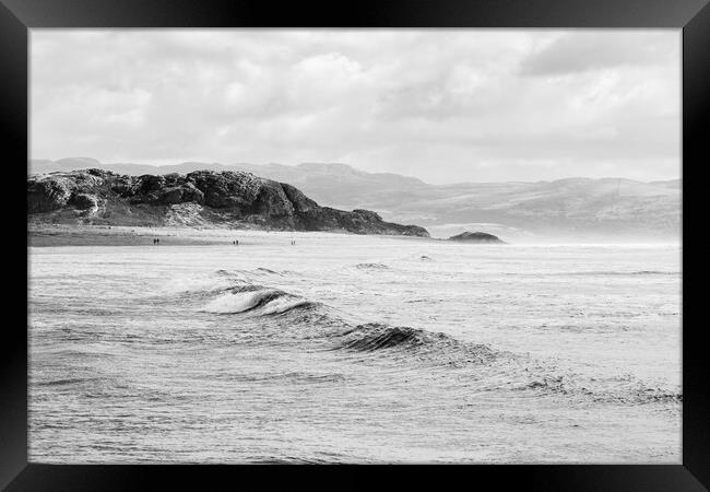 Waves crash onto Criccieth beach Framed Print by Jason Wells