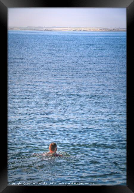 Whitstable Swimming Framed Print by Simon Connellan