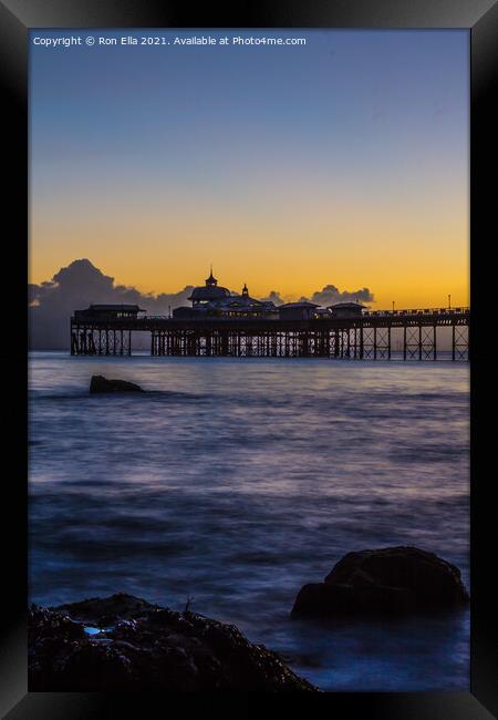 Sunrise on Llandudno Pier Framed Print by Ron Ella