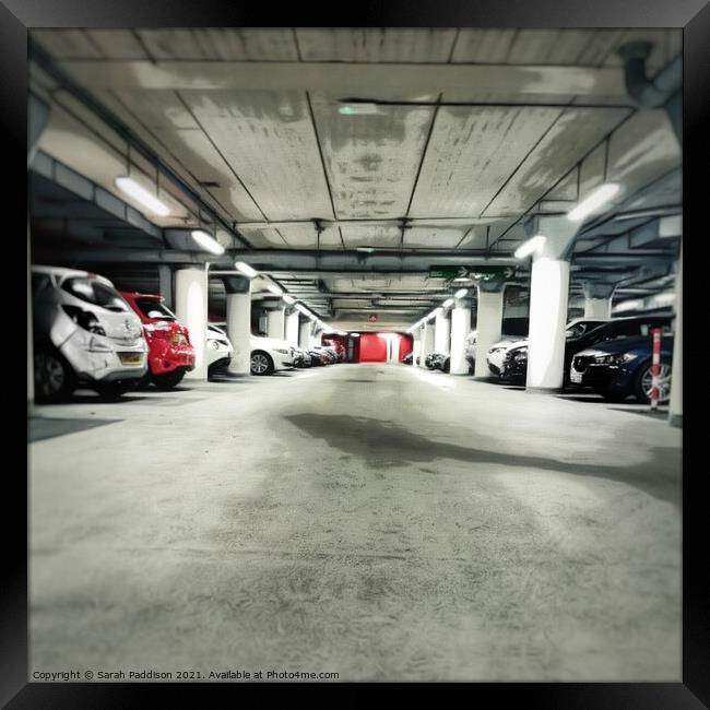 Underground parking garage Framed Print by Sarah Paddison