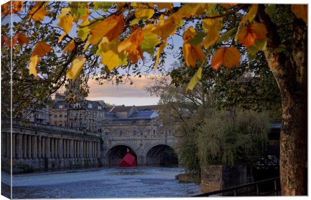 Pulteney Bridge and weir Autumn with sinking houses Canvas Print by Duncan Savidge