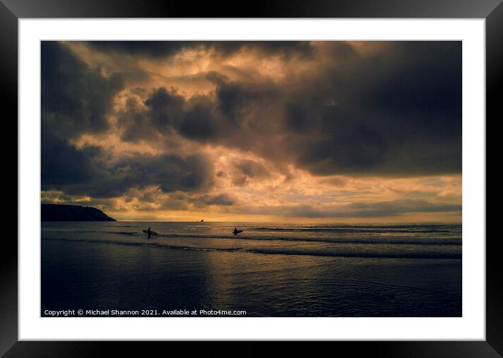 Surfers at Perranporth beach in Cornwall Framed Mounted Print by Michael Shannon