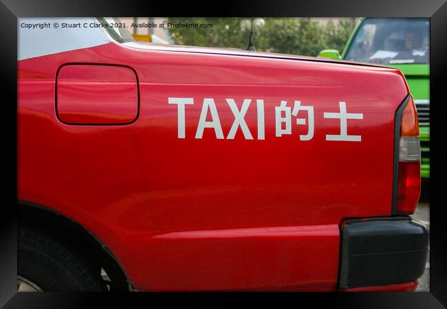 Hong Kong Taxi Framed Print by Stuart C Clarke