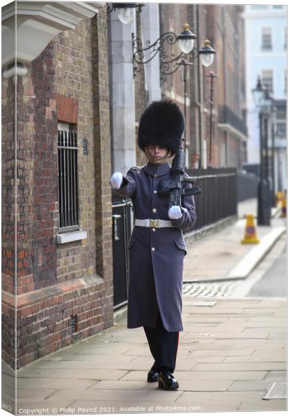 Irish Grenadier Guard marching at St James's Palace, London Canvas Print by Philip Pound