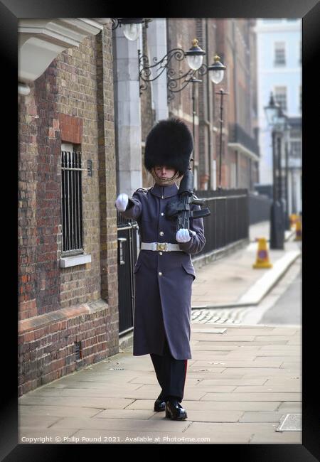 Irish Grenadier Guard marching at St James's Palace, London Framed Print by Philip Pound