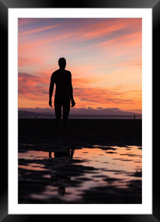 Colourful sunset of an Iron Man Framed Mounted Print by Jason Wells