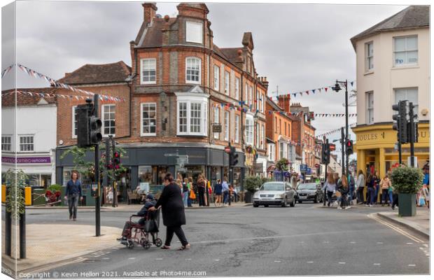 People shopping in the town centre.  Canvas Print by Kevin Hellon