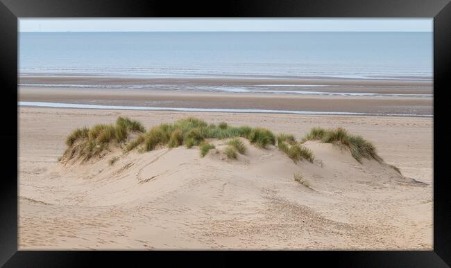 Formby beach over a sand dune Framed Print by Jason Wells