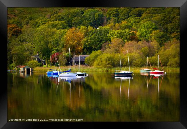 Coniston Water on a tranquil early autumn morning Framed Print by Chris Rose