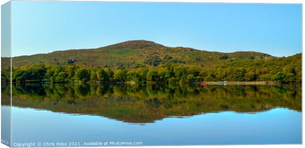 Coniston Water on a dead calm early autumn morning Canvas Print by Chris Rose