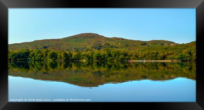 Coniston Water on a dead calm early autumn morning Framed Print by Chris Rose