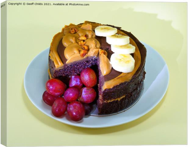 Chocolate Cake served with fruit on a plate. Photo is isolated o Canvas Print by Geoff Childs