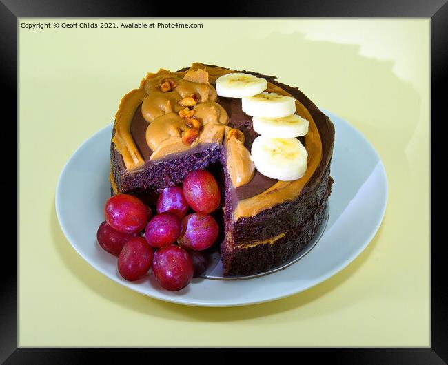 Chocolate Cake served with fruit on a plate. Photo is isolated o Framed Print by Geoff Childs