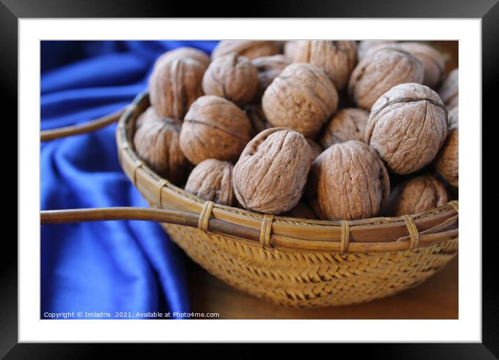 Walnuts in a basket with blue tablecloth Framed Mounted Print by Imladris 