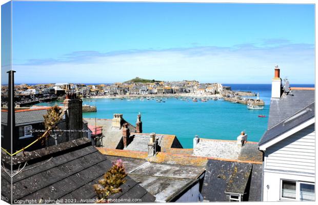View over the fooftops, St. Ives, Cornwall, UK. Canvas Print by john hill