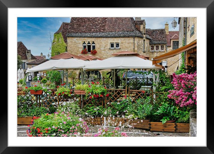 A Charming Cafe in the Heart of Domme Framed Mounted Print by Roger Mechan